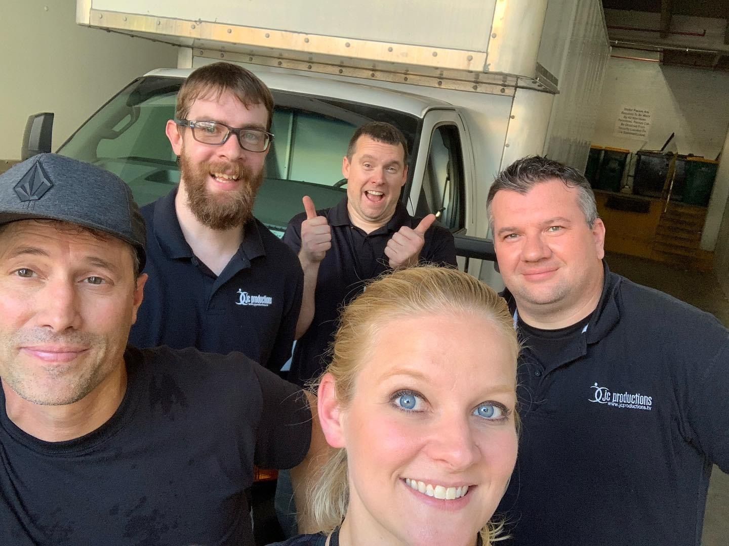JC Productions crew gathered at a production truck